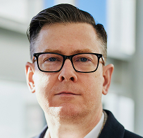 Alexander Hughes, egy kriptó kereskedési vállalat vezérigazgatója, portré